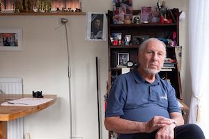 Older-man-sitting-at-home