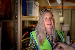 Older-woman-working-in-a-warehouse