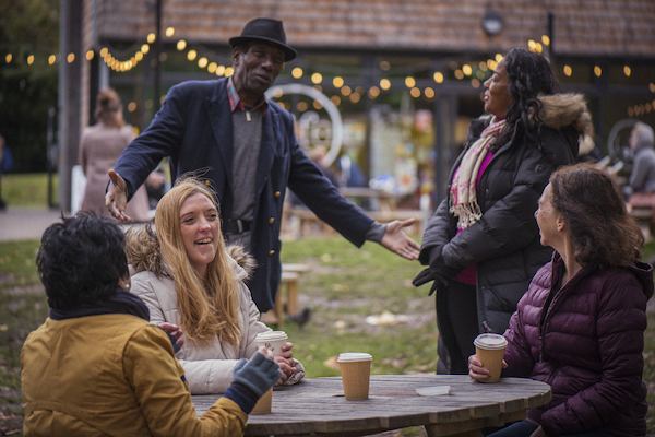 Group having coffee in the park