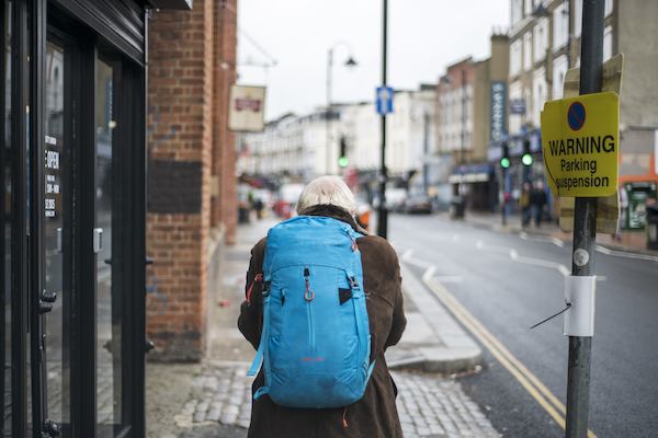 Older person with rucksack