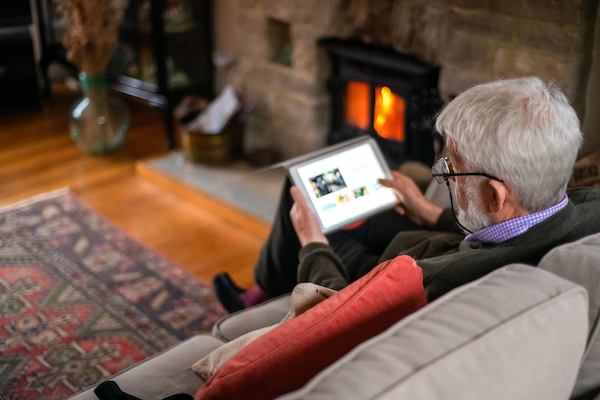 Older man using tablet