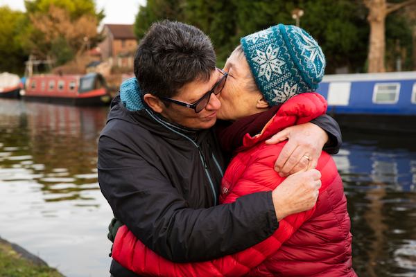 Older couple by a canal