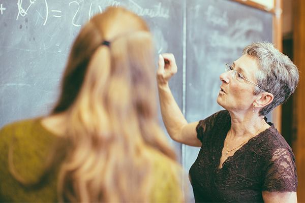 teacher using whiteboard