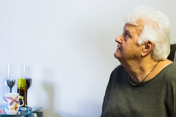 Woman sitting in armchair
