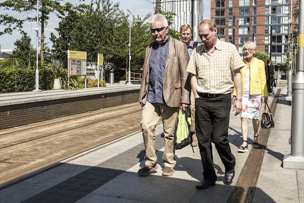 Commuters, Media City tram station, Manchester