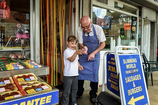 Butcher with young girl