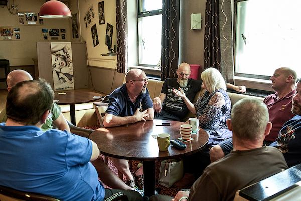 Group of people in later life in a bar