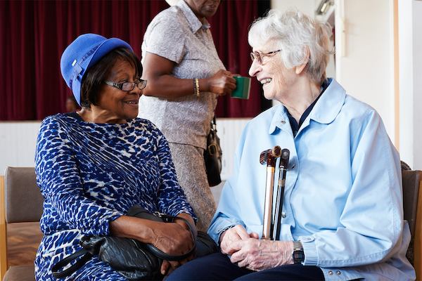 Two older women talking