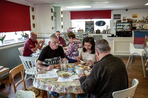 Cafe costumers conversing