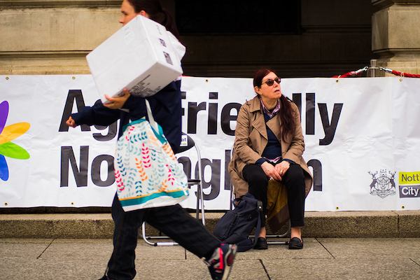 Older woman sitting on a chair