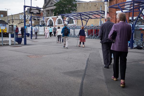 Older people at train station
