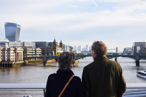 Older couple looking onto a river