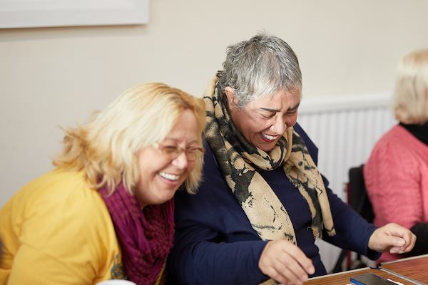 Woman hugging her friend