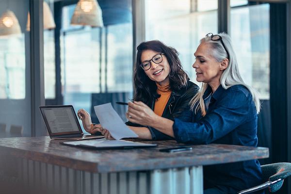 Older worker with younger worker