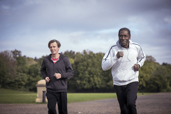 Two older men exercising outdoors