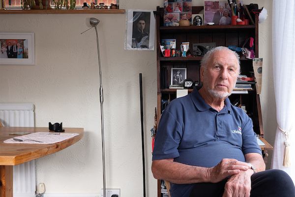 older man sitting down