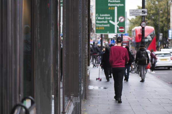 people walking down a street