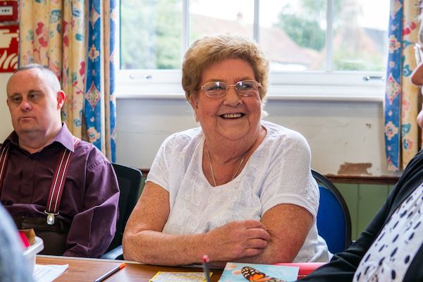 group of older people chatting together