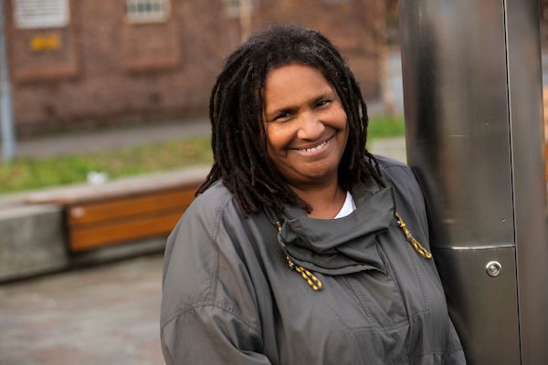 an older woman smiling into the camera