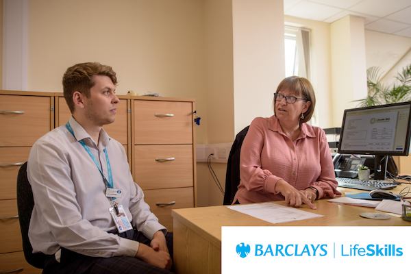 Two workers in an office