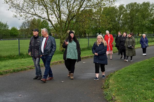 People walking along a road