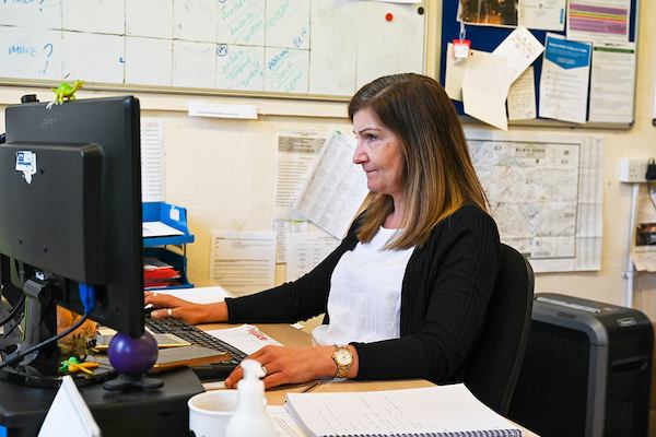 Older woman working on computer