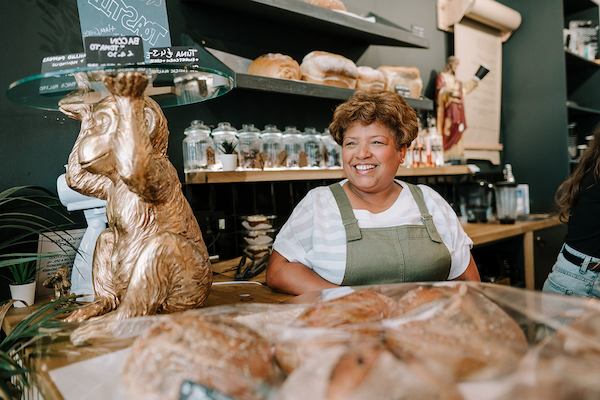 Older woman working in a cafe