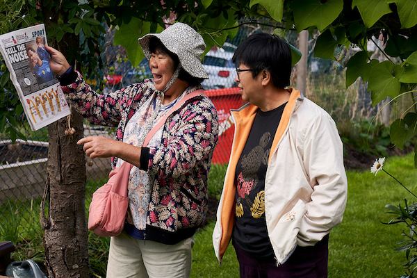 Two older women socialising outside