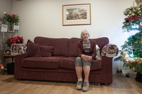 Older-woman-on-sofa