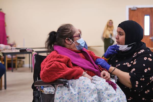 Older-woman-with-carer