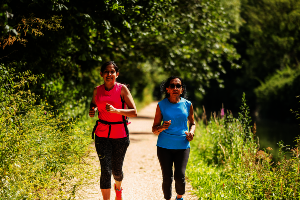 Two women jogging together